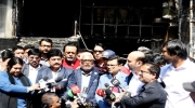 FBCCI delegation visits fire-ravaged building at Bailey Road